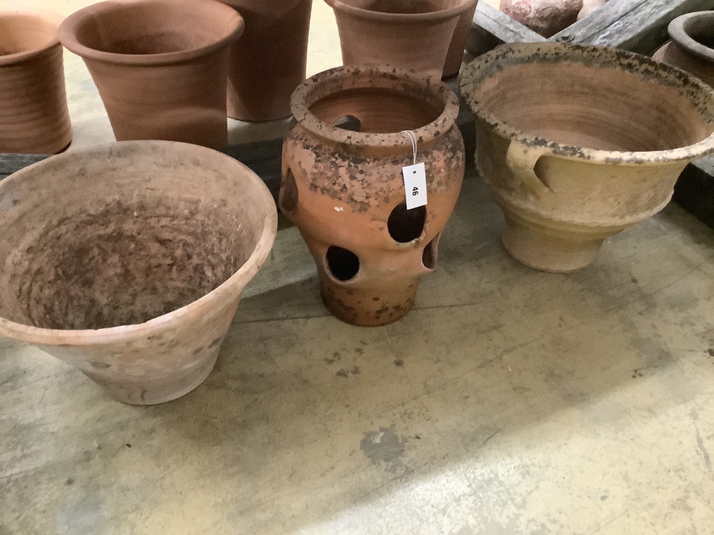 Two terracotta planters and a terracotta strawberry planter, largest 52cm diameter